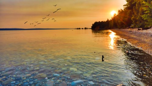 Camp With Views Of A Beautiful Great Lake At This RV Resort
