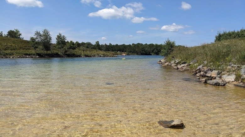Wisconsin's Deepest Inland Lake Boasts A Sandy Beach And Crystal-Clear Water - cover