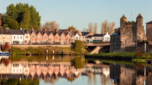 Northern Ireland's Only Island Town Boasts Castle Views, Cozy Shops, & Cobbled Streets