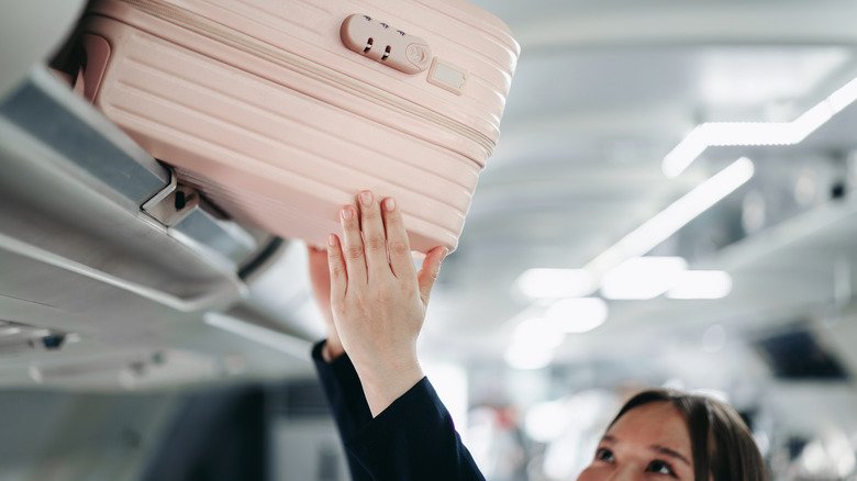 Follow This Simple Airplane Etiquette Rule To Avoid Overhead Bin Drama