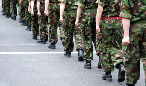 Hundreds of British troops head to Kosovo as Serbian army mass on border
