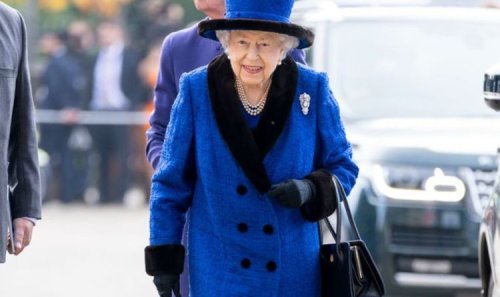 Beaming Queen in royal blue ditches her walking stick for Champions Day at Ascot