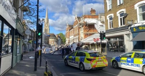 Car 'crushed' and residents evacuated after huge scaffolding structure collapses