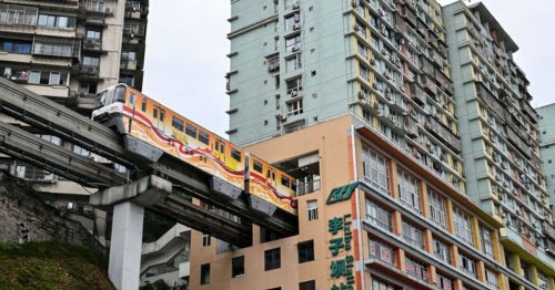 The train line that literally goes through the middle of a block of flats