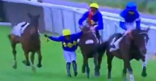 Jockey clings on to two horses at once after being unseated in bizarre scenes