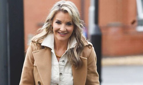 Helen Skelton puts on brave face as she hosts ex-husband's rugby match