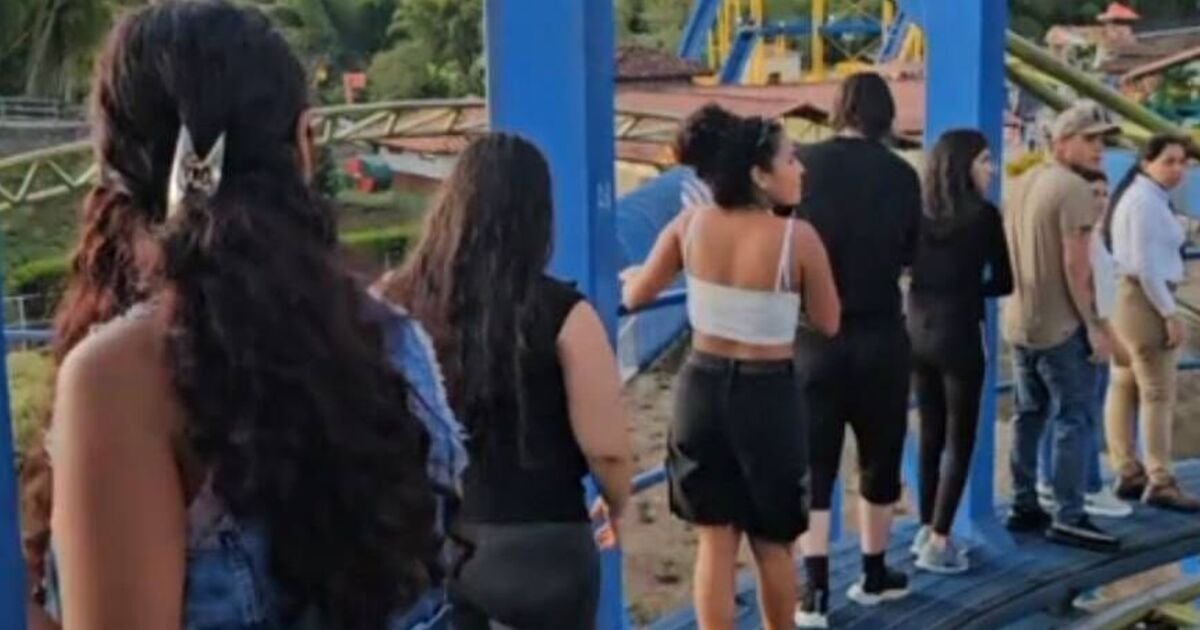 Terrified passengers climb down 22m rollercoaster after midair