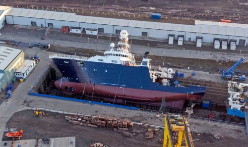Aerial photos show full scale of toppled research ship
