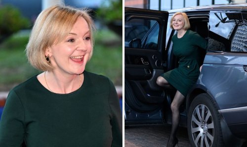 Truss puts on brave face as she arrives for party conference