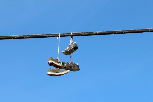 Why Do People Throw Shoes on Power Lines?