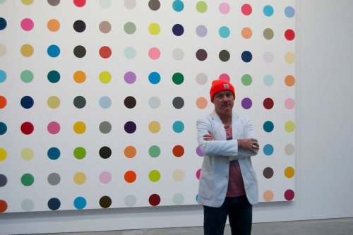 Damien Hirst is to burn thousands of his paintings next month