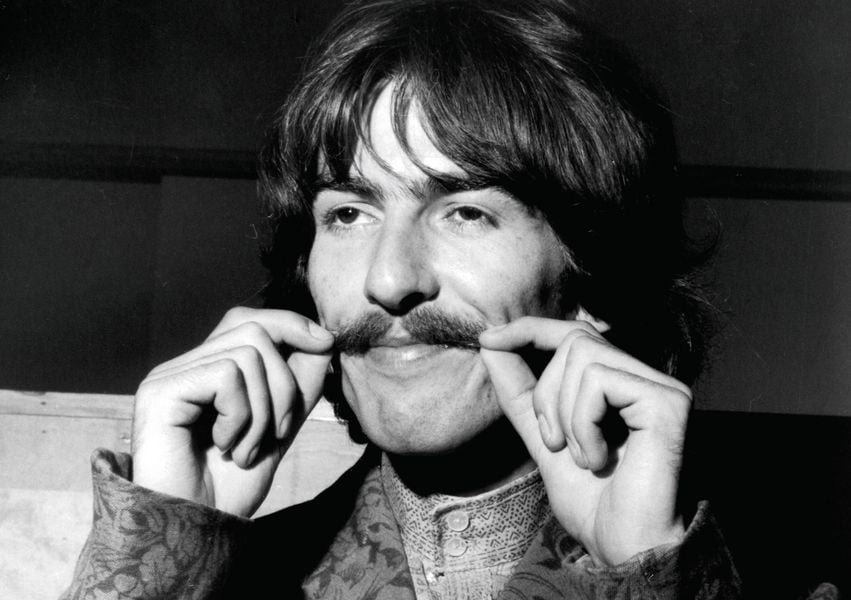 What songs did George Harrison write for The Beatles?