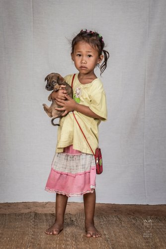 Portraits of People and their Dogs in Rural Laos