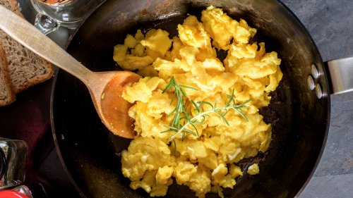 The Secret to Perfectly Fluffy Scrambled Eggs Is Already Sitting In Your Fridge