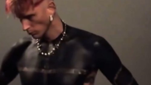 Machine Gun Kelly shows off shocking new tattoo covering upper body in black ink