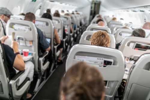 Passenger Refuses To Let Person In The Middle Use The Bathroom On Flight
