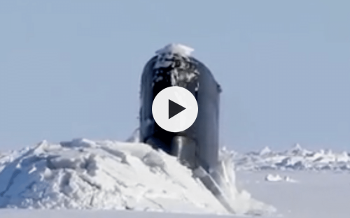 $2billion submarine seen breaking out of ice in jaw-dropping footage