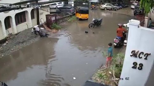 India: Incredible act of courage! Man risks his life to rescue 9-year-old boy from electrocution in flooded roadway