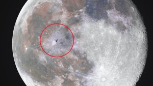 Incredible Photo Catches ISS Mid-Space Walk Passing In Front of the Moon
