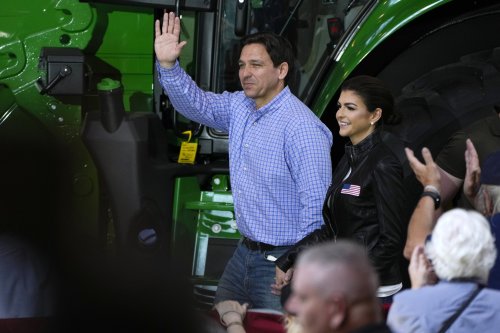 DeSantis signs Bible, Pence hops on motorcycle at 'Roast and Ride' rally in Iowa