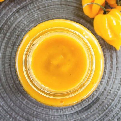 This Hot Sauce is made with Mango and Habanero Peppers #mondayvibes
