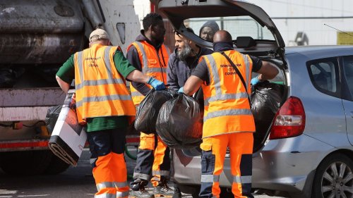 Brummies drop rubbish at mobile bin lorries while volunteers try to clean streets