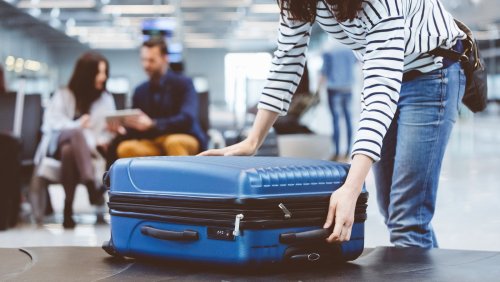 The Simple Item You Should Really Hope Airline Staff Never Put On Your Luggage