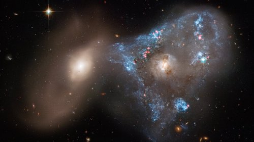 Hubble Images Two Galaxies In Spectacular Head-On Collision