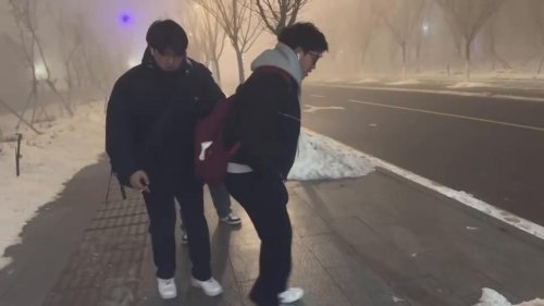 China: A Boy Suddenly Slips on the Ice