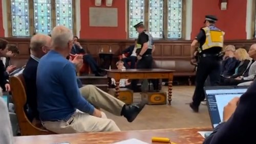 Watch: Trans rights protester who glued hands to floor at Kathleen Stock’s Oxford talk removed by police