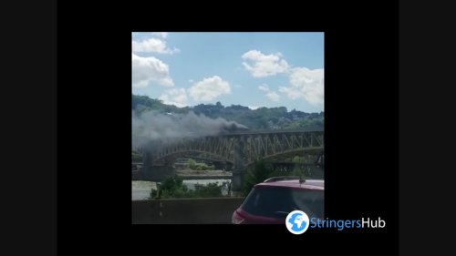 US: Garbage Truck Catches Fire On Liberty Bridge Causing Traffic Jams