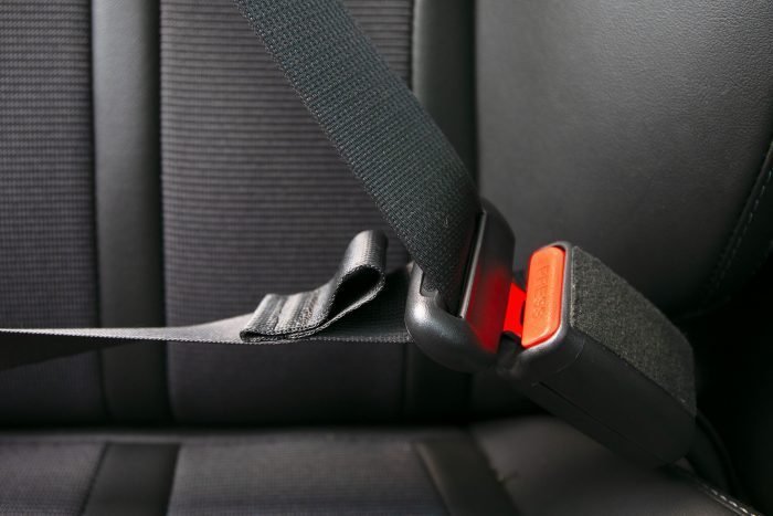 Why Your Seatbelt Has a Fabric Loop—And the Driver's Seatbelt Doesn't