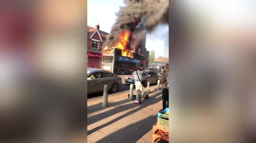 Dramatic moment double decker bus is engulfed in flames during arson attack on busy city road
