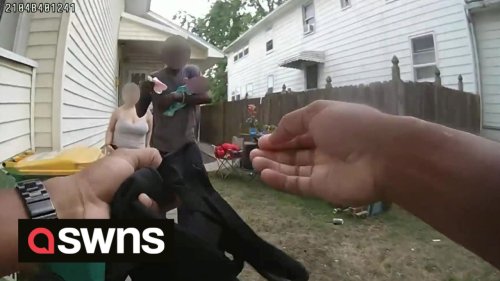 Bodycam footage shows heroic moment cop saves choking baby as desperate parents watch