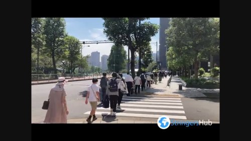 Long lines of people heading to offer flowers for mourning Shinzo Abe's death in Tokyo, Japan