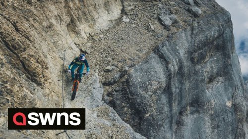 Nerve-shredding scenes as daredevil British mountain biker takes on Italy mountains