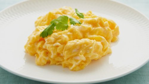 The Uncommon Ingredient That Gives Scrambled Eggs A Boost