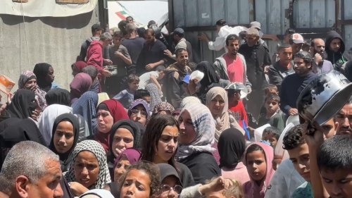 Aid groups distribute meals in Nuseirat refugee camp in enclaved Gaza