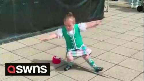 Determined highland dancer who falls over gets straight back up and carries on