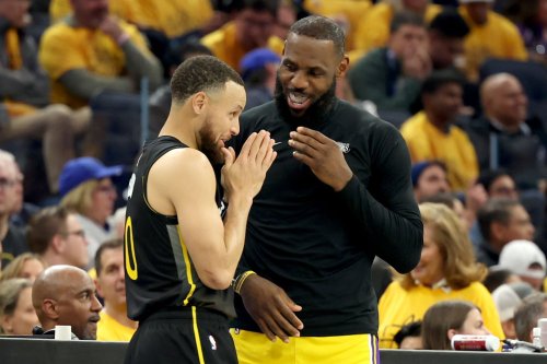 Bizarre photo of Steph Curry and LeBron James kissing truly baffles fans