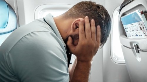 Flight Attendant Reveals Why These Rows Are The Absolute Worst On Any Plane