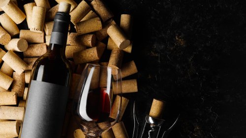 Use A Rolling Pin To Fit Corks Back Into Wine Bottles