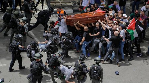 Israel police beat pallbearers at Al Jazeera journalists's funeral