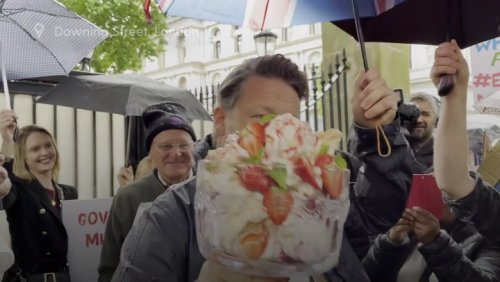 Jamie Oliver holds eton mess dessert outside Downing Street during protest