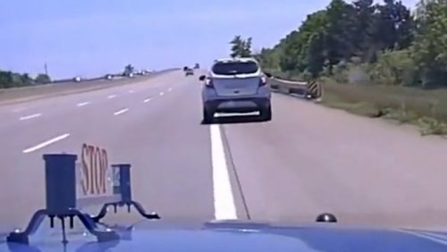 Watch: 10-year-old boy swerves down highway driving stolen car