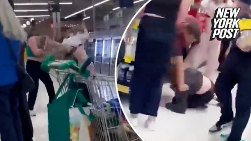 Woman passes baby to man so she can jump into supermarket brawl in chaotic video