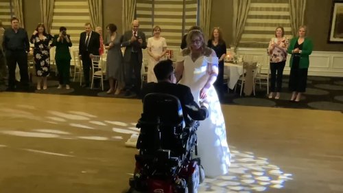 Groom who uses wheelchair has year of physiotherapy to stand for his first dance