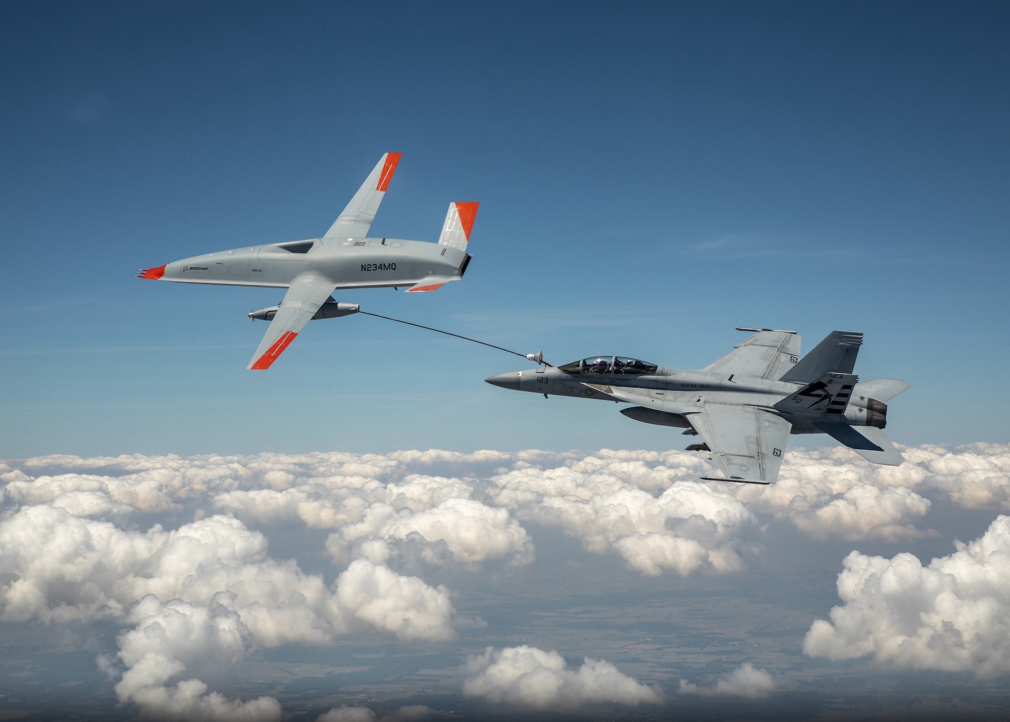 A drone and fighter jet just made 'wet contact' for the first time ever
