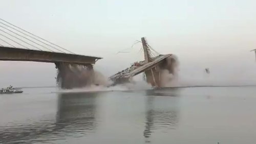 Moment under-construction bridge collapses into river in Northern India