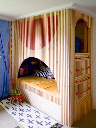A Murphy bed unlocked space for built-in bunks in this kids’ room